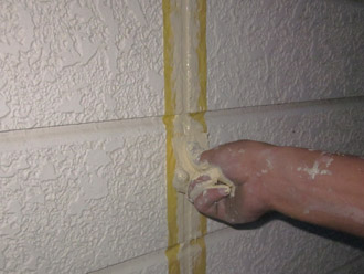 千葉市稲毛区　棟板金交換　屋根塗装　外壁塗装　目地の補修　余分なコーキング材の除去と慣らし