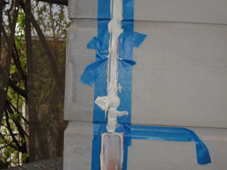 屋根塗装工事　目地補修　コーキング材ならし